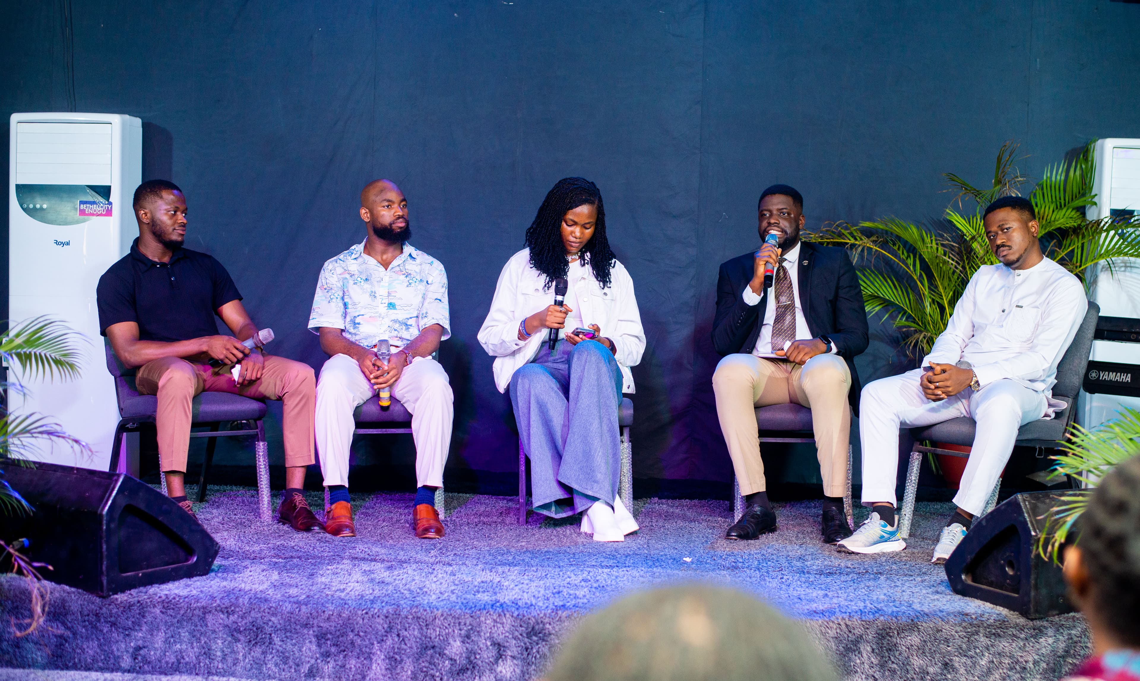 David Ejere speaking on a panel discussion