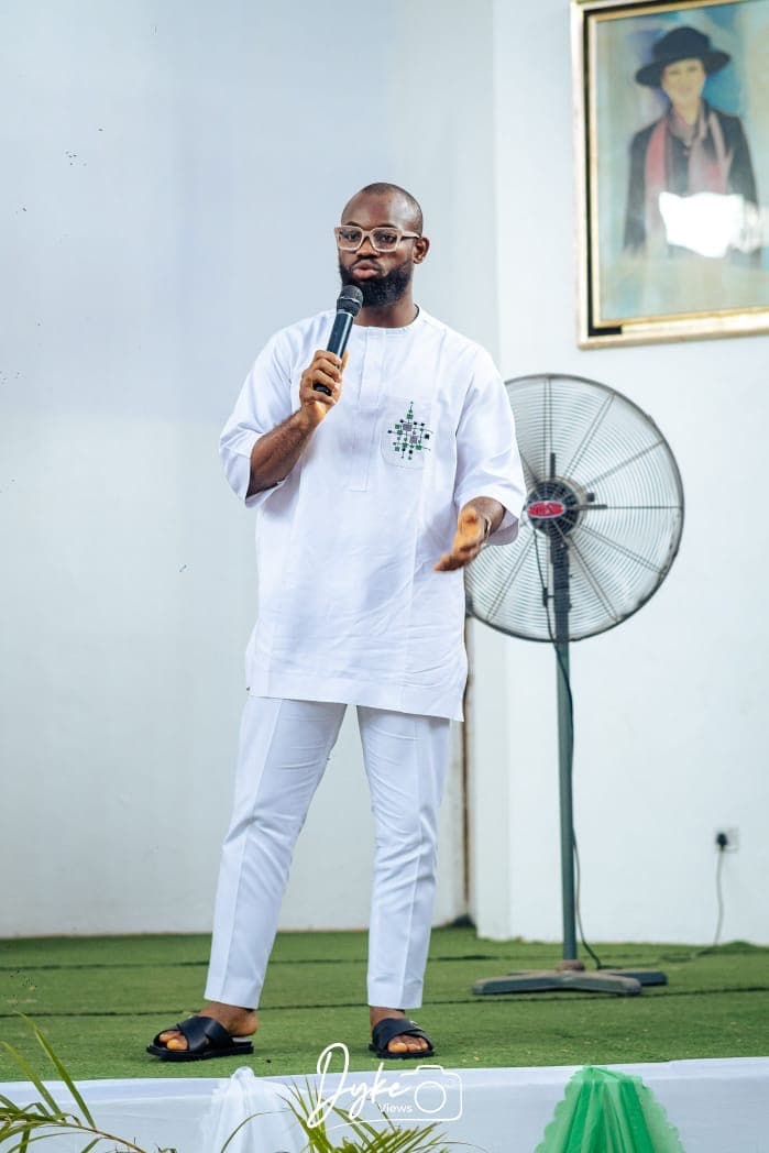 David Ejere addressing the audience on stage